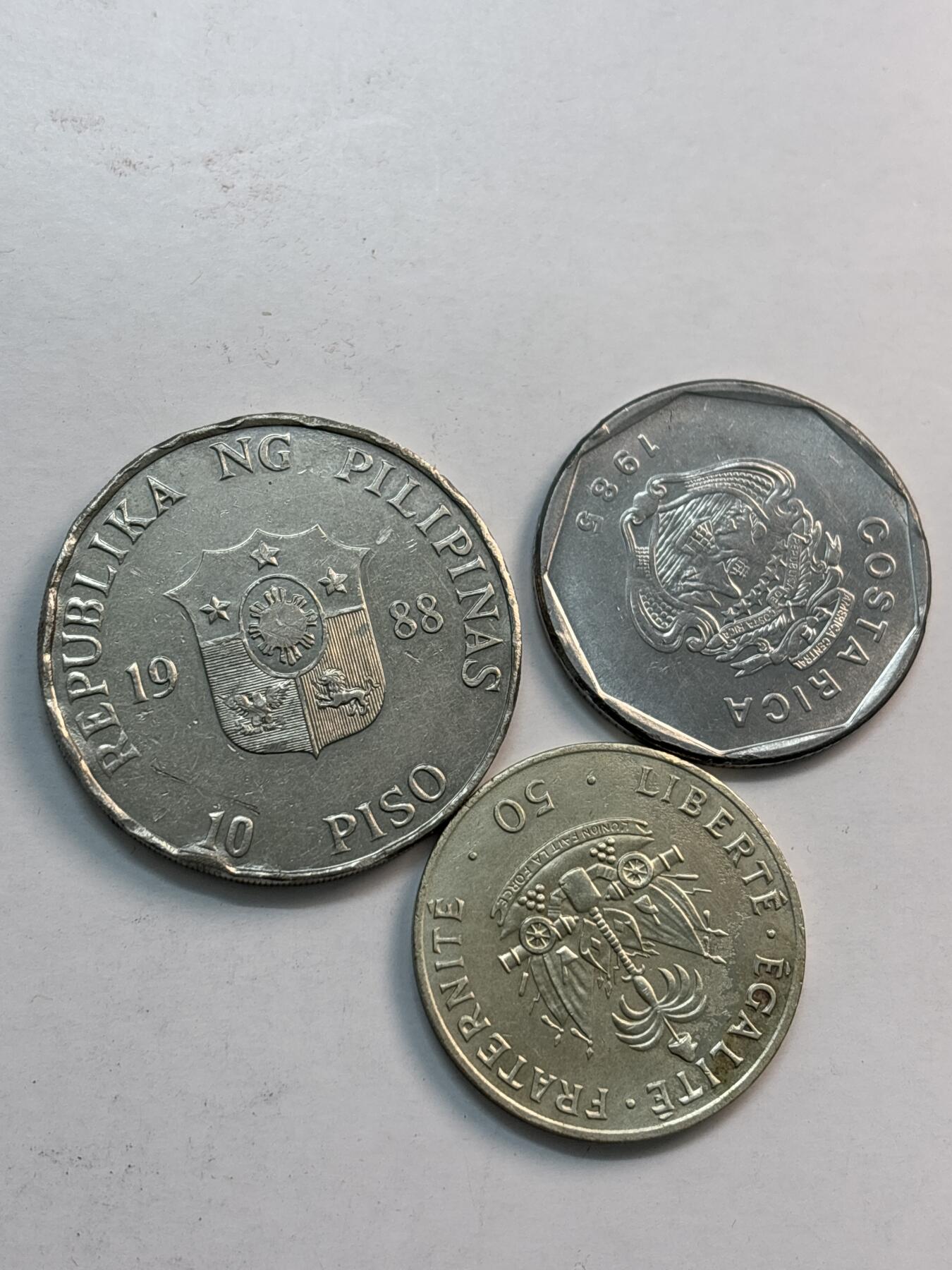 文馨钱币收藏第 282 场，【 长期接收代拍品】，加拿大老铜代用币，银币，德三系列场 海地，哥斯达黎加，菲律宾，包含少见菲律宾 10 比索大型纪念币 3 枚