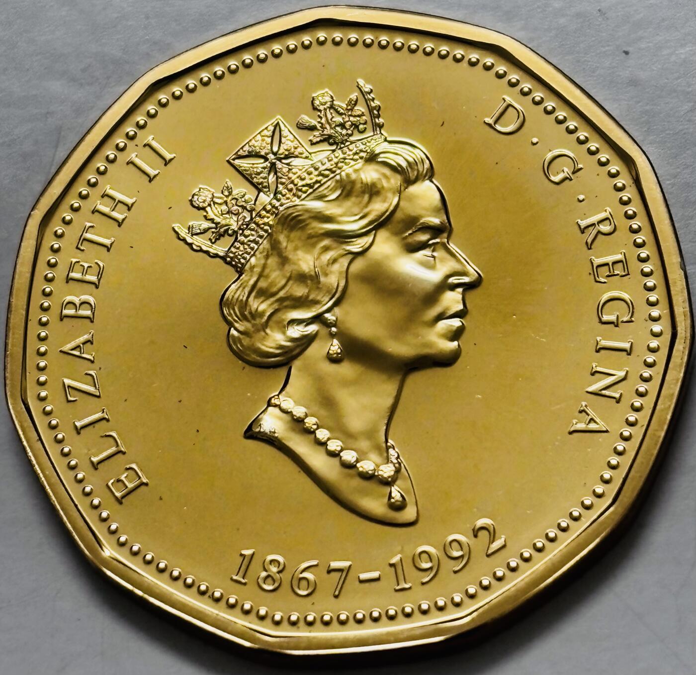 文馨钱币收藏第 282 场，【 长期接收代拍品】，加拿大老铜代用币，银币，德三系列场 少见全新未流通 1992 年加拿大 加拿大联邦政府成立 125 周年一元纪念币