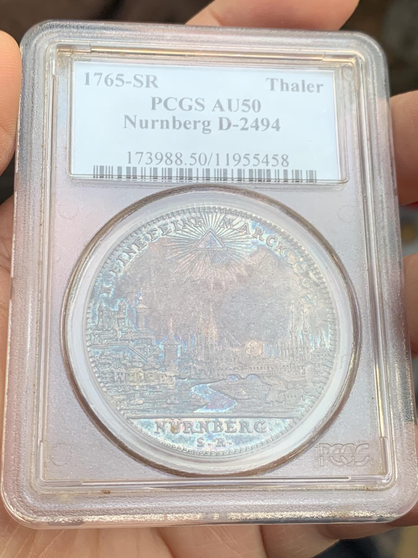 《竞宝斋》第441场 周日，周一，2场连拍 （全场包邮） PCGS AU50  德国纽伦堡1765年双头鹰景观泰勒大银币 早期P盒 保存很不错 状态包浆同样惊人美丽