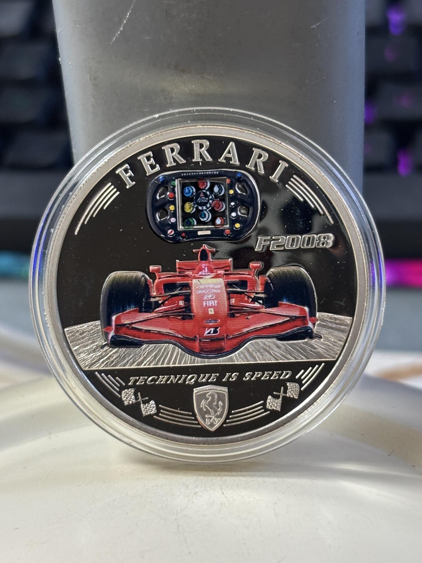 第183期拍卖 库克2008法拉利F2008赛车多功能方向盘彩色银币，500银，25克，