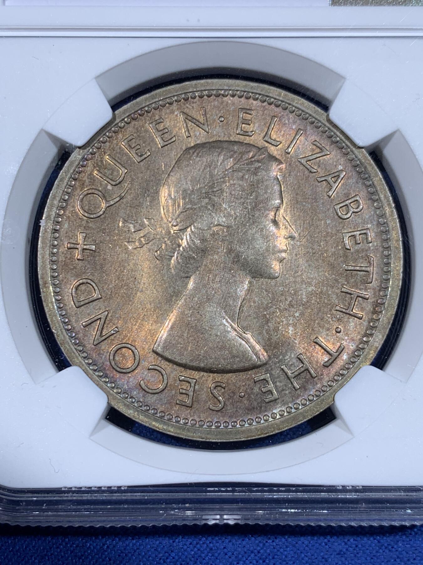 《竞宝斋》第441场 周日，周一，2场连拍 （全场包邮） NGC MS64 南罗德西亚1953年1克朗纪念大银币，双面金黄包浆，分数尚佳，难得的品种分数包浆都优秀的一枚币