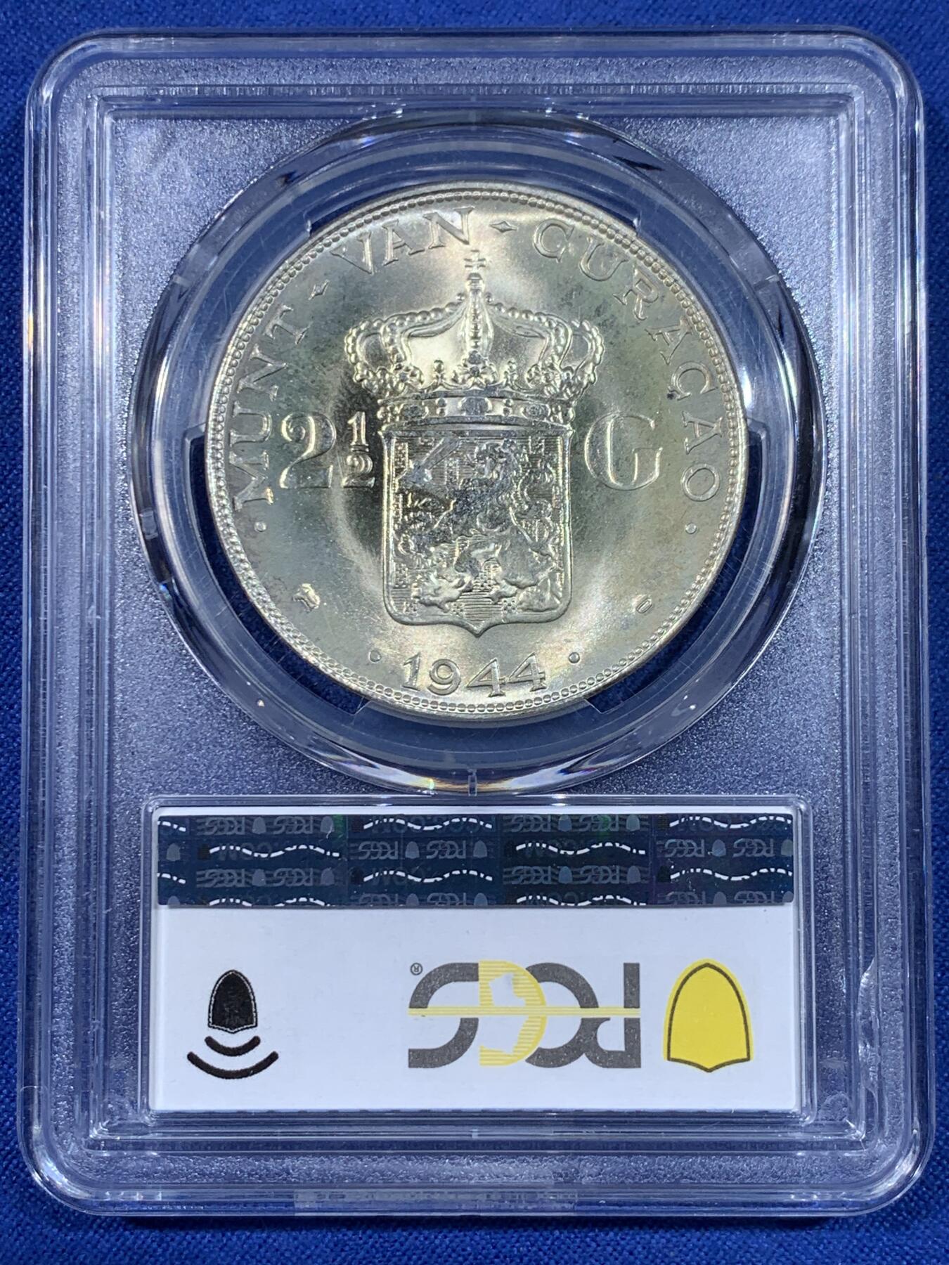 《竞宝斋》第441场 周日，周一，2场连拍 （全场包邮） PCGS MS65 荷属库拉索1944年2.5盾大银币 背面卡脚有损，密封正常