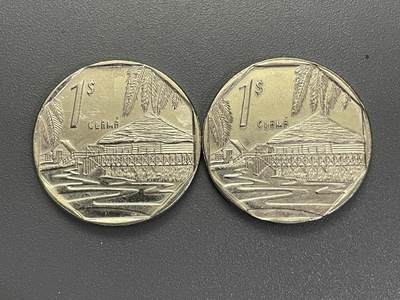 回流1123 - 古巴1998年外汇旅游币1比索 右边那枚可能是错版币 正常应该是正背逆向，