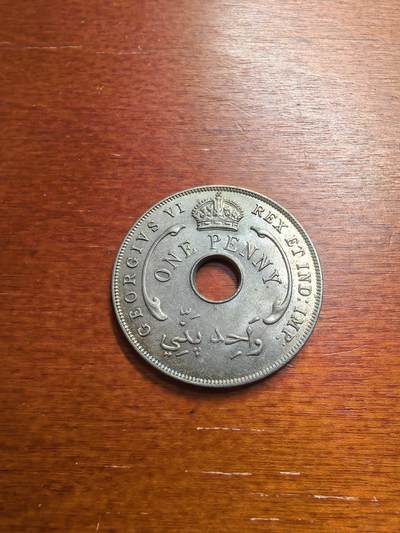 长老汇蛇年精选第七十七场拍卖 - 1943英属西非乔治六世1便士中孔铜镍币，喜敦版，小年，克书MS60分20美金，未流通品