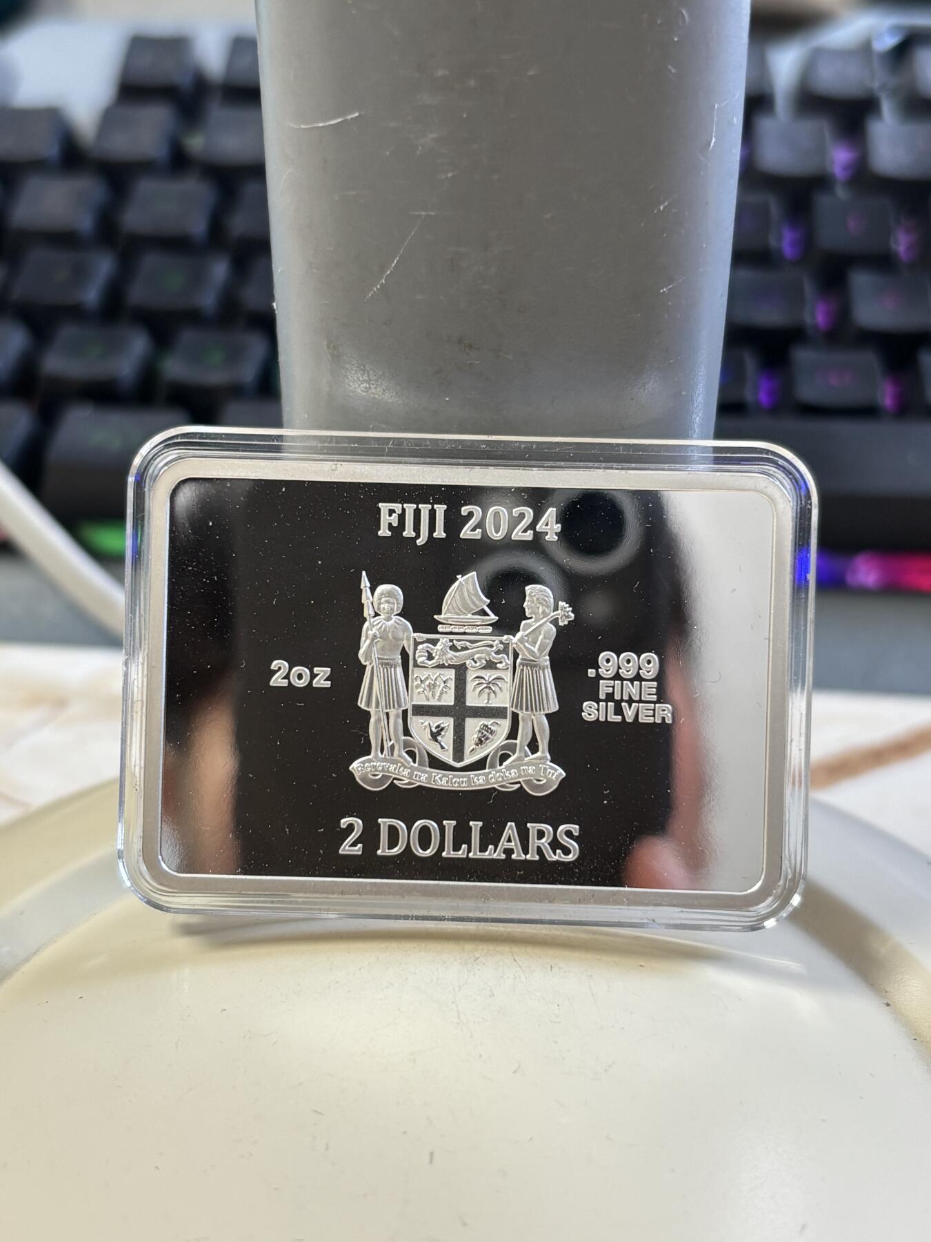 第183期拍卖 斐济2024年星空下的蒙娜丽莎2盎司矩形纪念彩银币，999银，发行300枚，