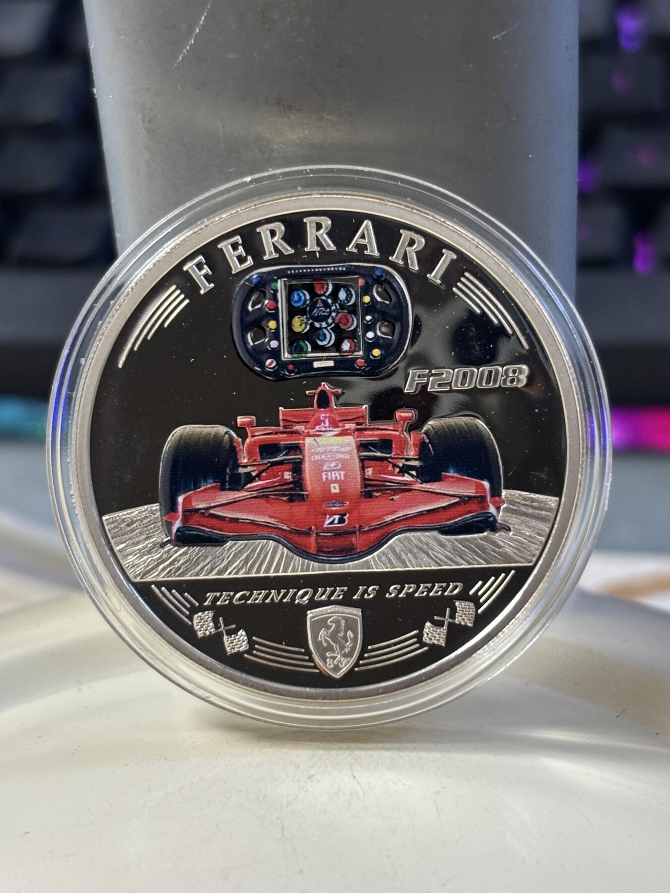 第183期拍卖 库克2008法拉利F2008赛车多功能方向盘彩色银币，500银，25克，
