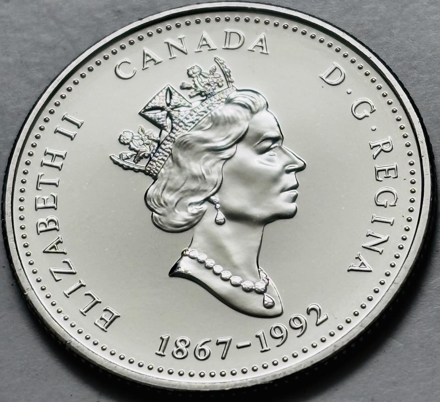 文馨钱币收藏第 282 场，【 长期接收代拍品】，加拿大老铜代用币，银币，德三系列场 少见全新未流通 1992 年加拿大 曼尼托巴联邦成立 125 周年 25 分纪念币