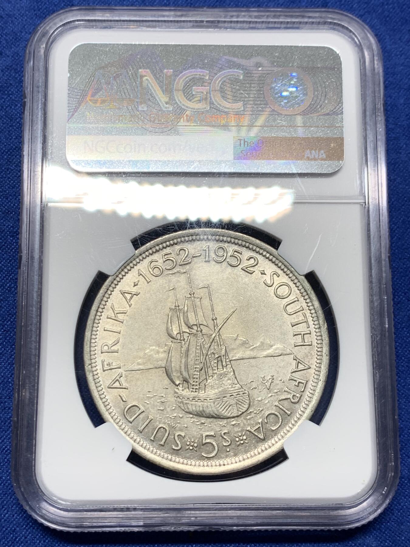 《竞宝斋》第441场 周日，周一，2场连拍 （全场包邮） NGC AU55 南非1952年乔六发现开普敦建城300周年5先令大银币，高点俱在