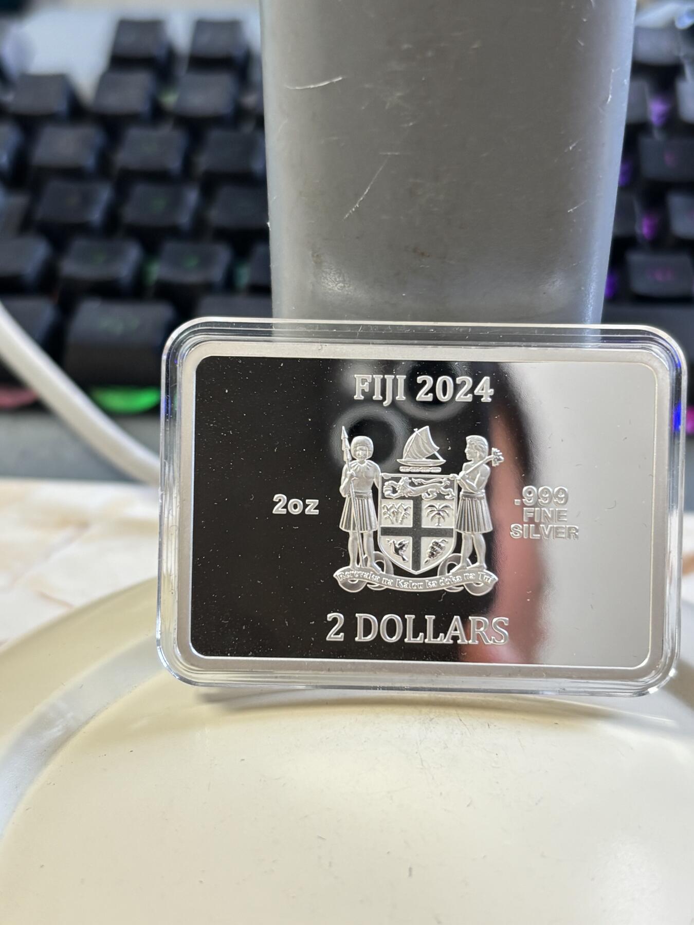 第183期拍卖 斐济2024年星空下的蒙娜丽莎2盎司矩形纪念彩银币，999银，发行300枚，