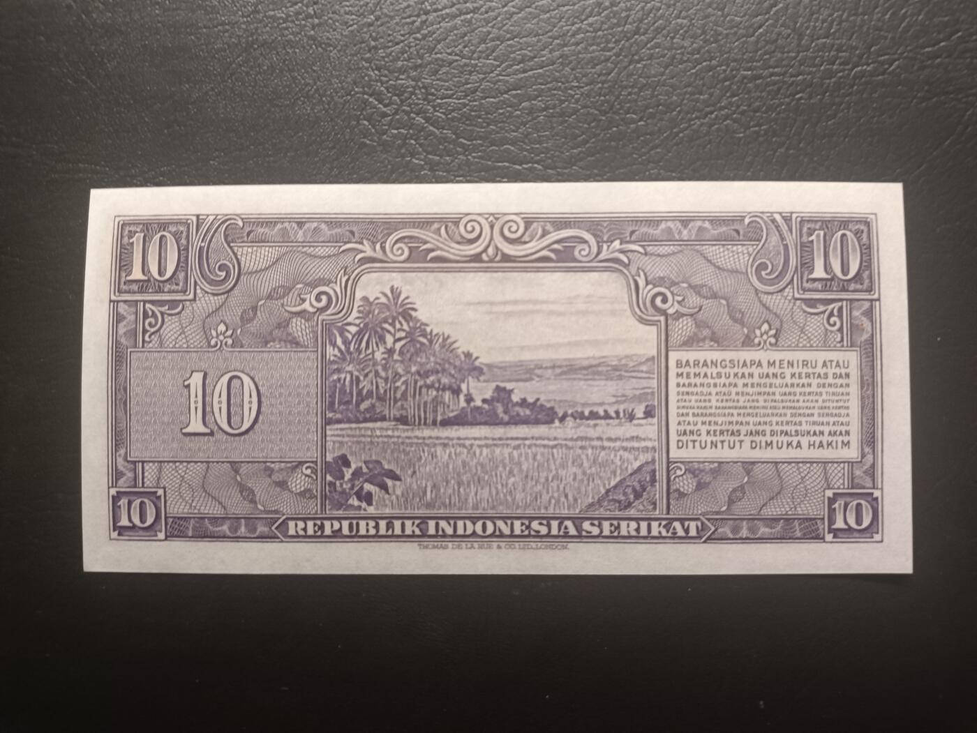 2025十一月第六期，总第204期 印度尼西亚1950版10卢比UNC-有针孔无47，苏加诺总统和田野，早期稀有品种
