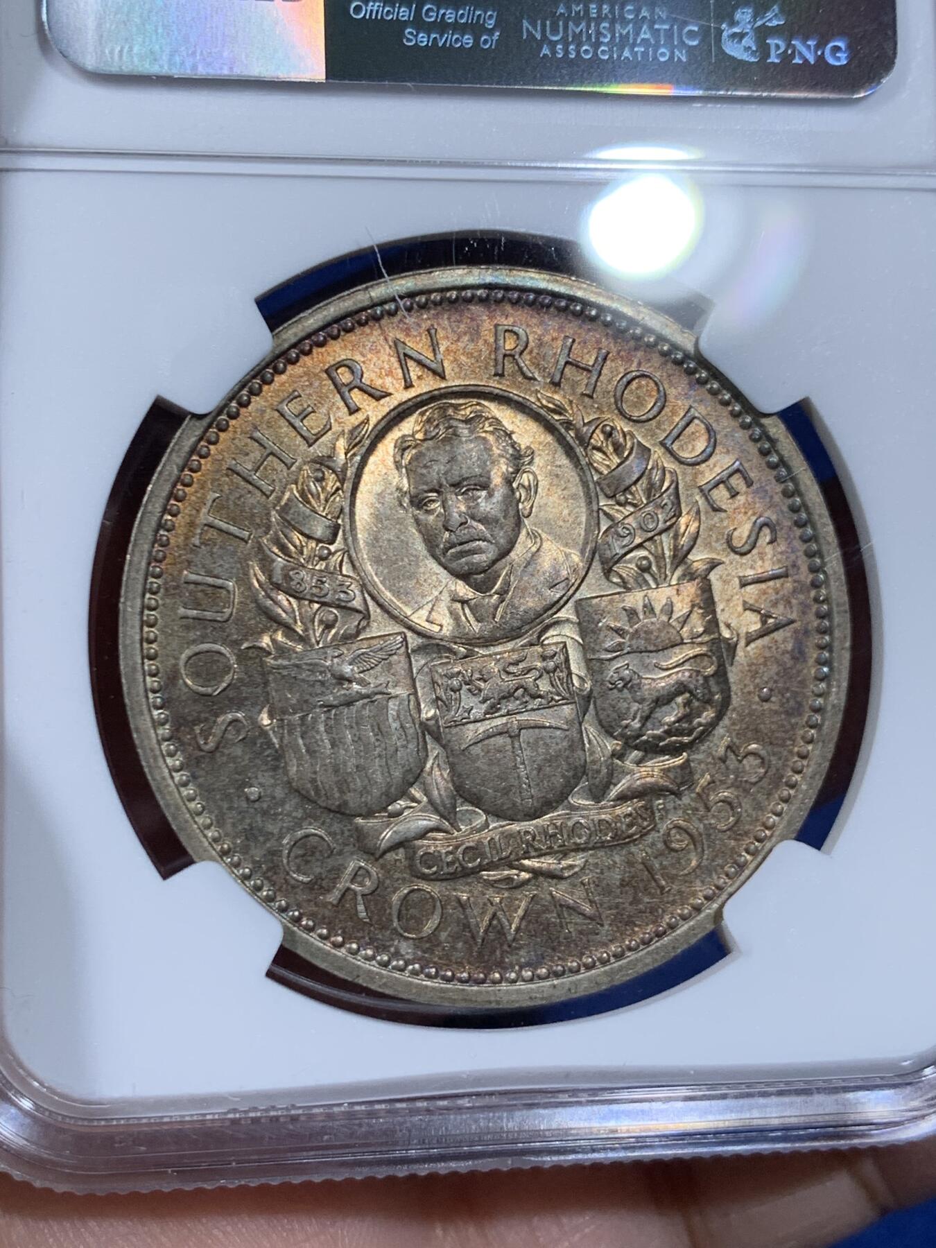 《竞宝斋》第441场 周日，周一，2场连拍 （全场包邮） NGC MS64 南罗德西亚1953年1克朗纪念大银币，双面金黄包浆，分数尚佳，难得的品种分数包浆都优秀的一枚币