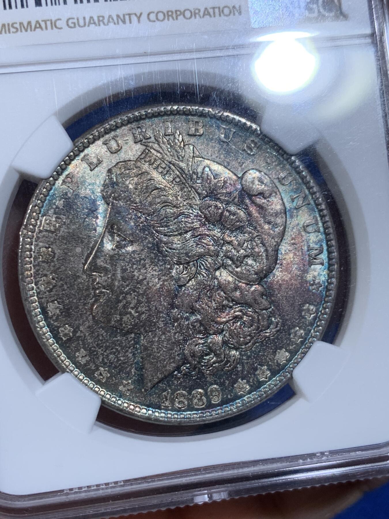 《竞宝斋》第441场 周日，周一，2场连拍 （全场包邮） NGC MS63 美国1889年摩根银币P厂 少见彩种，蓝紫满彩，绚烂而神秘