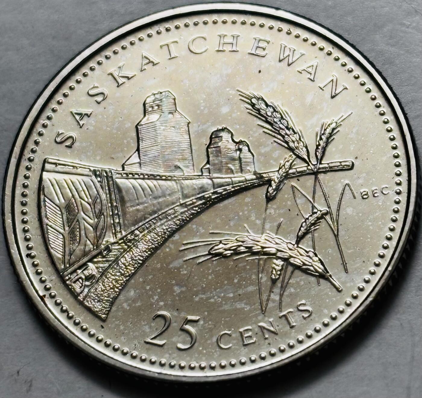 文馨钱币收藏第 282 场，【 长期接收代拍品】，加拿大老铜代用币，银币，德三系列场 少见全新未流通 1992 年加拿大 萨斯客切温省联邦 125 周年 25 分纪念币