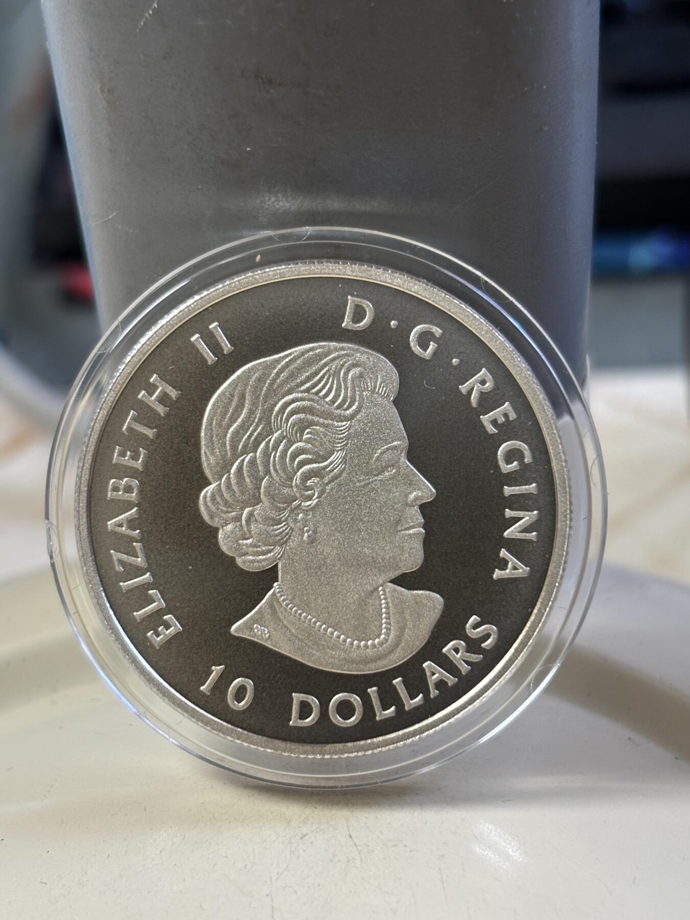 第183期拍卖 加拿大2017飞机漂浮在麦肯齐河150周年纪念彩银币，9999银，15.87克