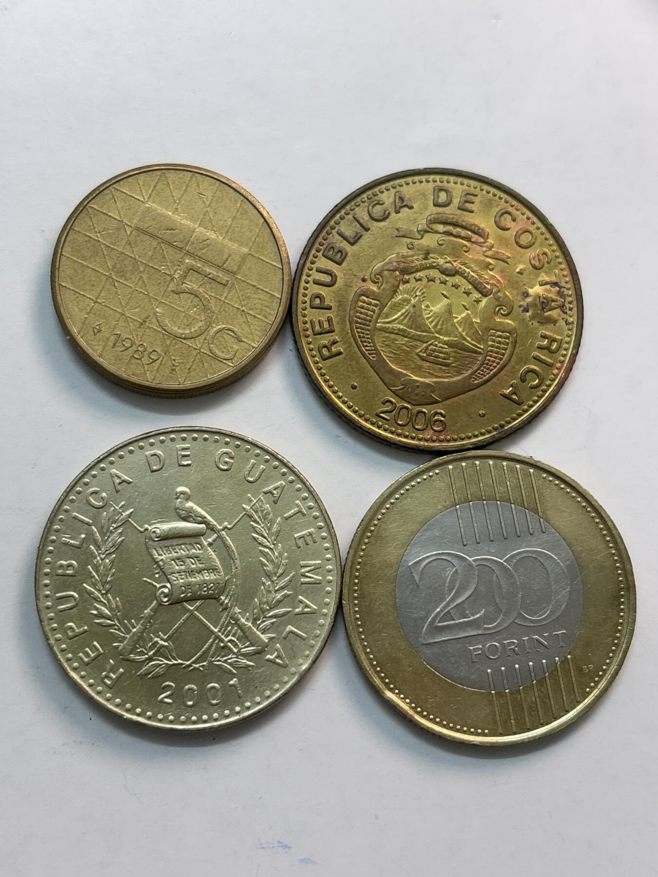 文馨钱币收藏第 282 场，【 长期接收代拍品】，加拿大老铜代用币，银币，德三系列场 荷兰，哥斯达黎加，危地马拉，匈牙利 200 福林，匈牙利单卖一个都要十多块了，共 4 枚