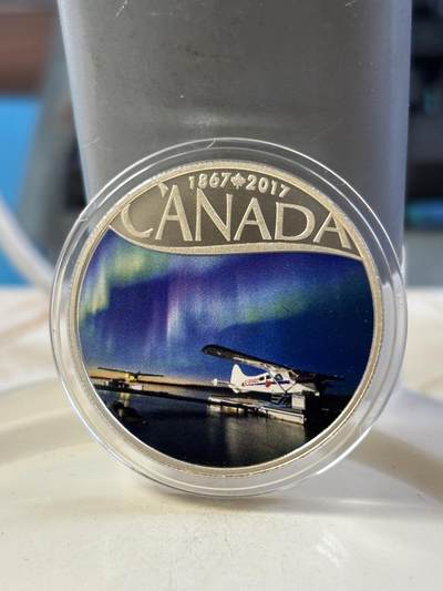 第183期拍卖 - 加拿大2017飞机漂浮在麦肯齐河150周年纪念彩银币，9999银，15.87克