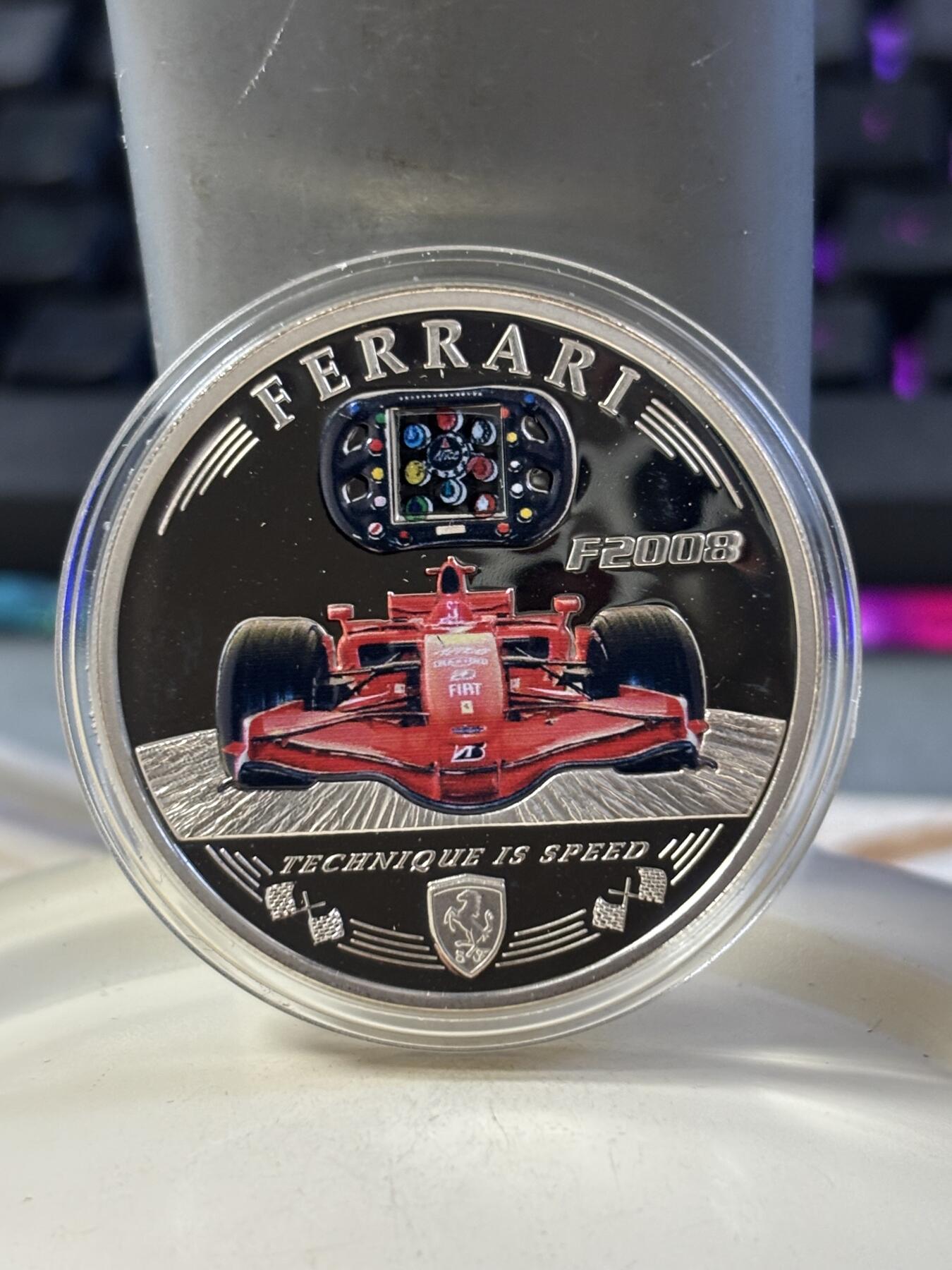 第183期拍卖 库克2008法拉利F2008赛车多功能方向盘彩色银币，500银，25克，