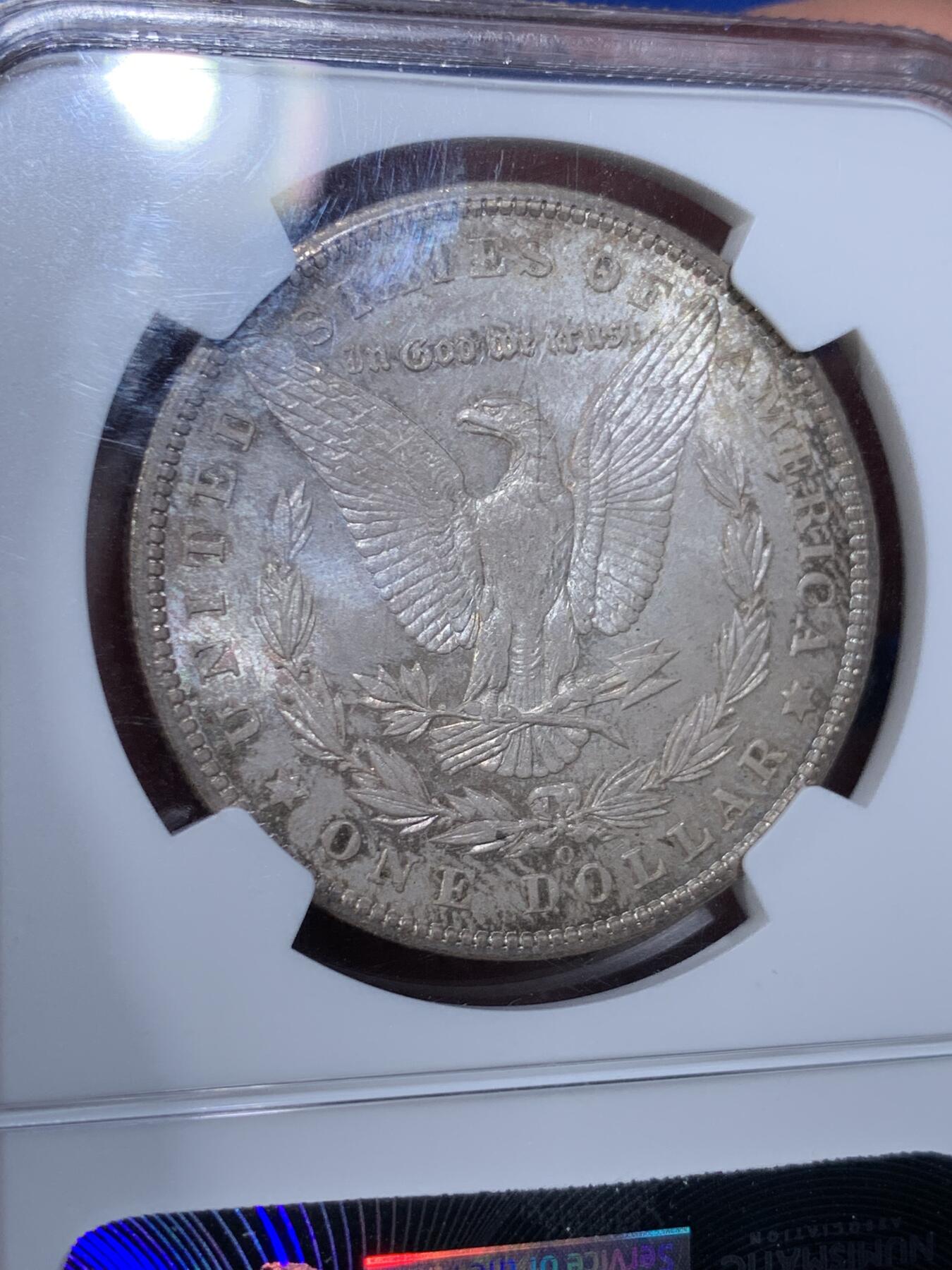 《竞宝斋》第441场 周日，周一，2场连拍 （全场包邮） NGC MS64 美国1904年摩根银币O厂 凝霜+转光效果很好的一枚，鹰面可以看出摩根的镜面PL效果，灰色满彩给人强烈的高冷