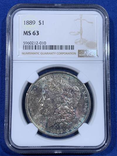 《竞宝斋》第441场 周日，周一，2场连拍 （全场包邮） - NGC MS63 美国1889年摩根银币P厂 少见彩种，蓝紫满彩，绚烂而神秘