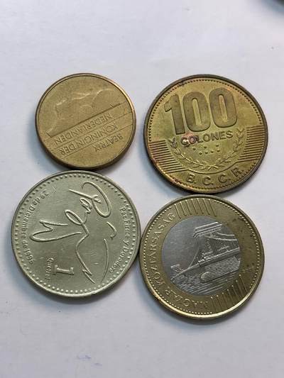 文馨钱币收藏第 282 场，【 长期接收代拍品】，加拿大老铜代用币，银币，德三系列场 - 荷兰，哥斯达黎加，危地马拉，匈牙利 200 福林，匈牙利单卖一个都要十多块了，共 4 枚