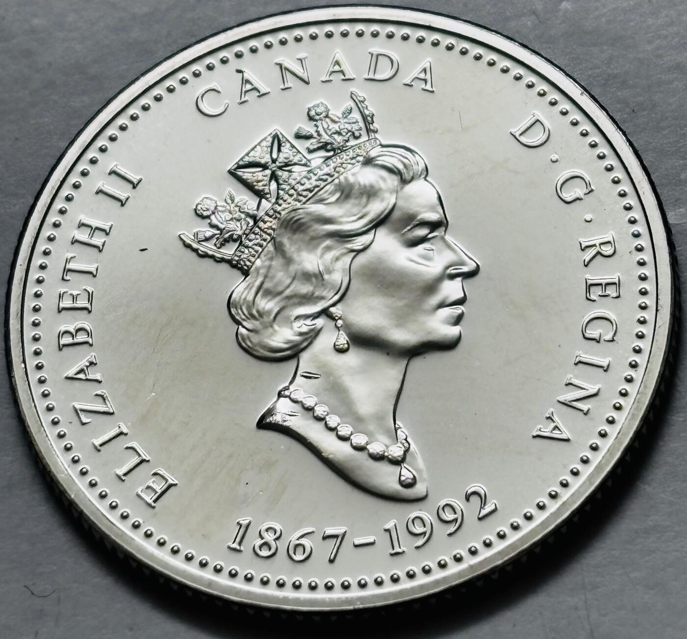 文馨钱币收藏第 282 场，【 长期接收代拍品】，加拿大老铜代用币，银币，德三系列场 少见全新未流通 1992 年加拿大 阿尔伯塔省联邦成立125 周年 25 分纪念币