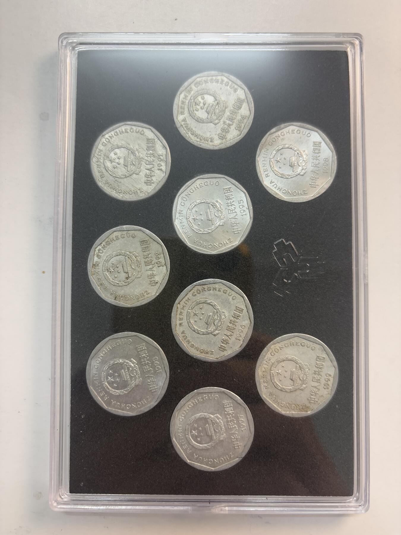 文馨钱币收藏第 282 场，【 长期接收代拍品】，加拿大老铜代用币，银币，德三系列场 退出流通市场 1991-1999 年菊花一角套币，带盒子