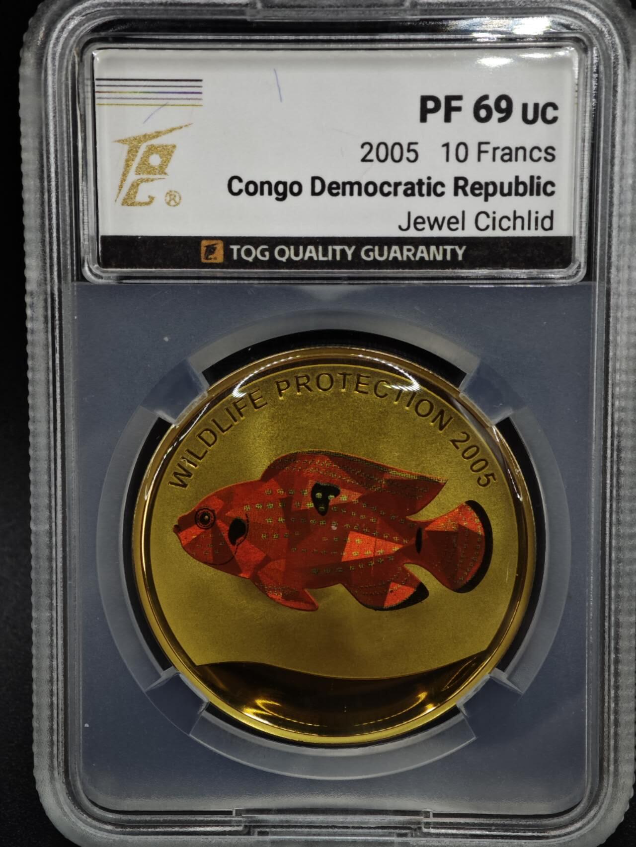 【淘币小摊】实时拍第八百零八拍   银币套币场   满百包邮可预留二周 每周一统一发货   2005年民主刚果10非洲法郎幻彩精制银币  野生动物保护-宝石慈鲷 25克925银 发行量：5千 TQG PF69UC