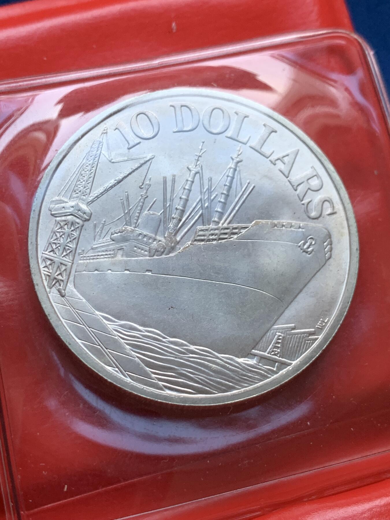 《竞宝斋》第442场 周日，周一，2场连拍 （全场包邮） 新加坡1977年建国10周年纪念轮船银币，福字包装一盎司31克，含银50%