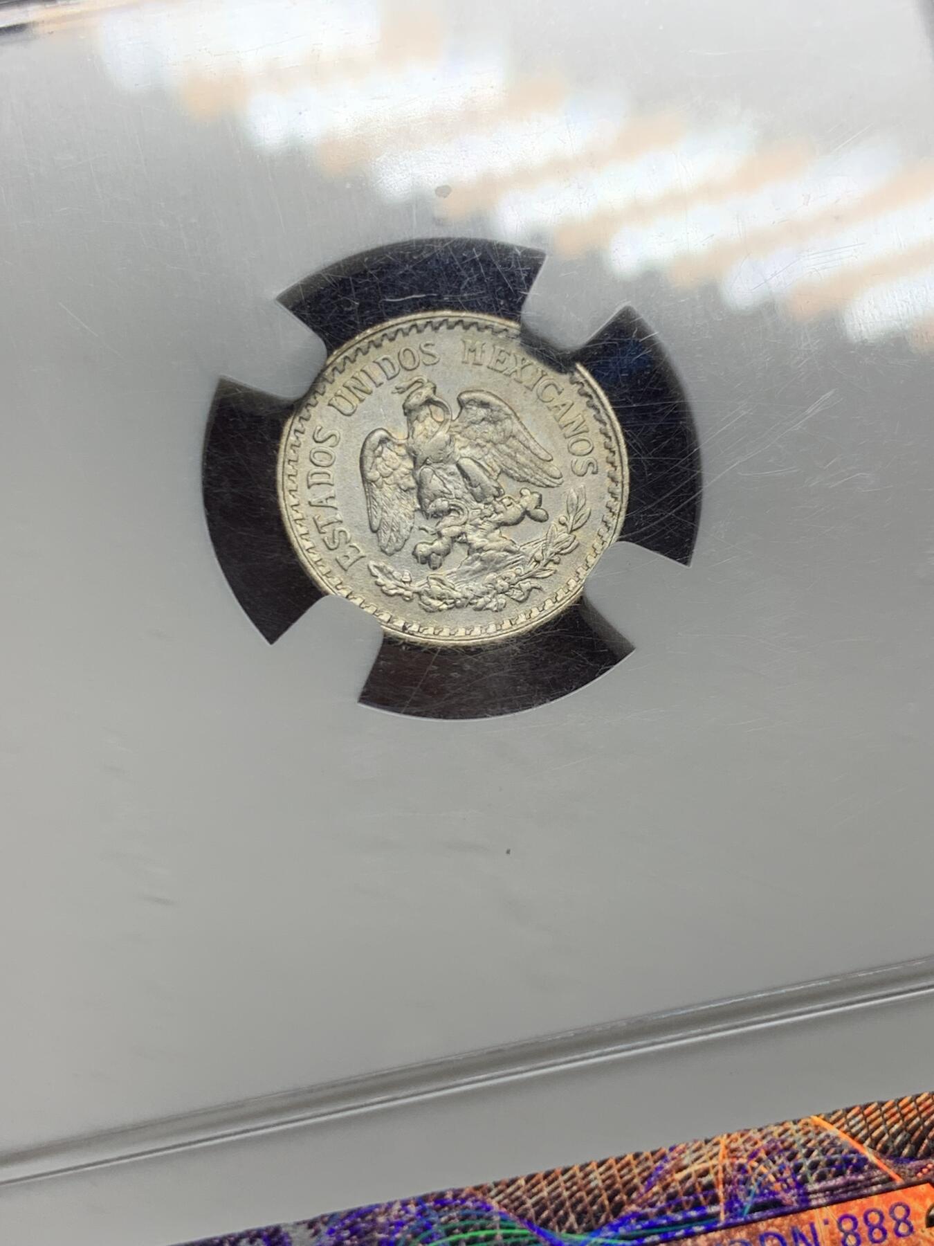 《竞宝斋》第442场 周日，周一，2场连拍 （全场包邮） NGC XFD 墨西哥1919年10分银币 淡淡银光 NGC早期紫色评级标签