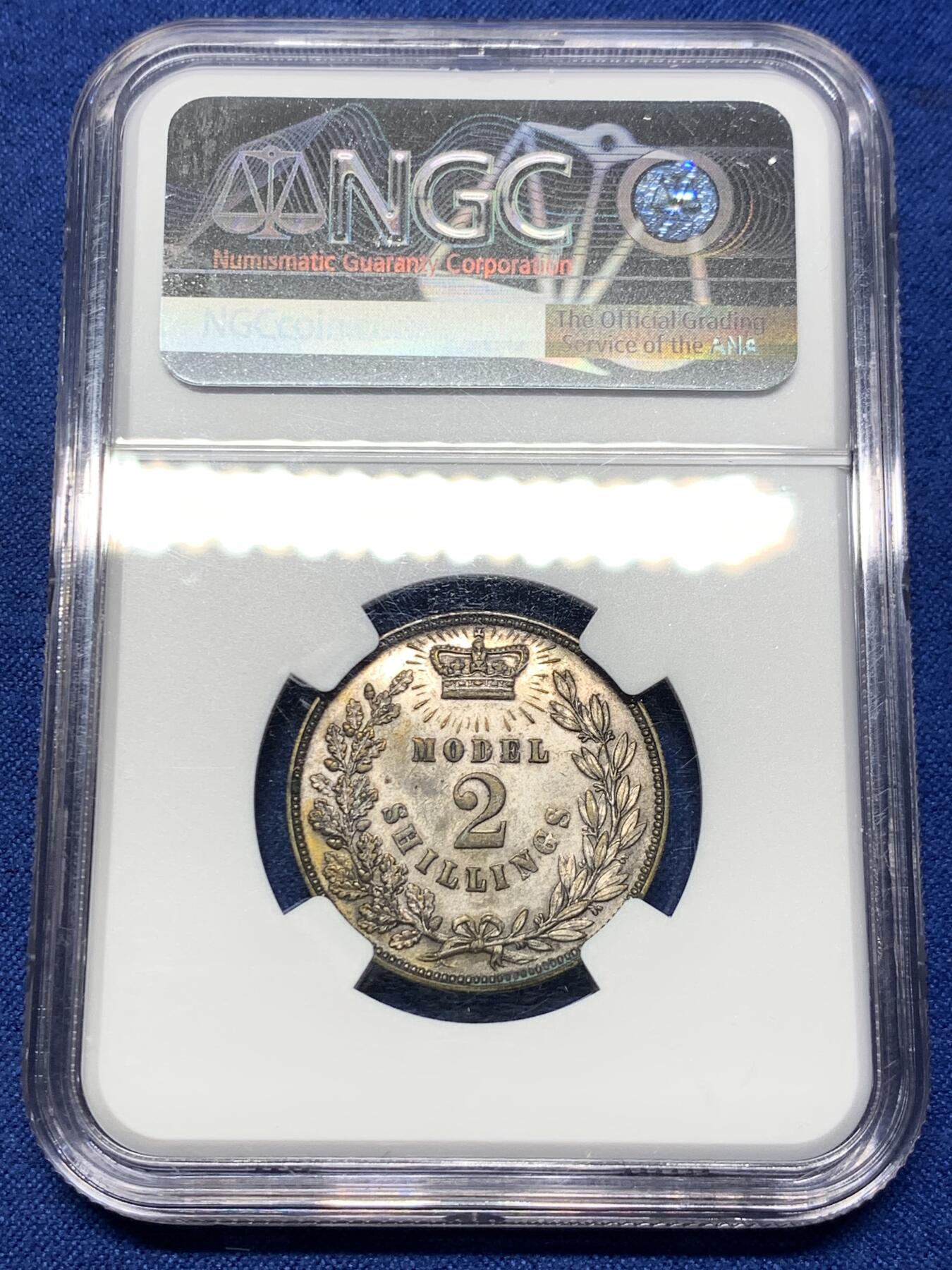 《竞宝斋》第442场 周日，周一，2场连拍 （全场包邮） NGC MS62 英国1850年代龙马2先令model，稀见品种，实际铸于1849年，与双色克朗同属一个系列，但远比双色系列更稀少。不列颠女神驾驭龙马，行于波涛之上
