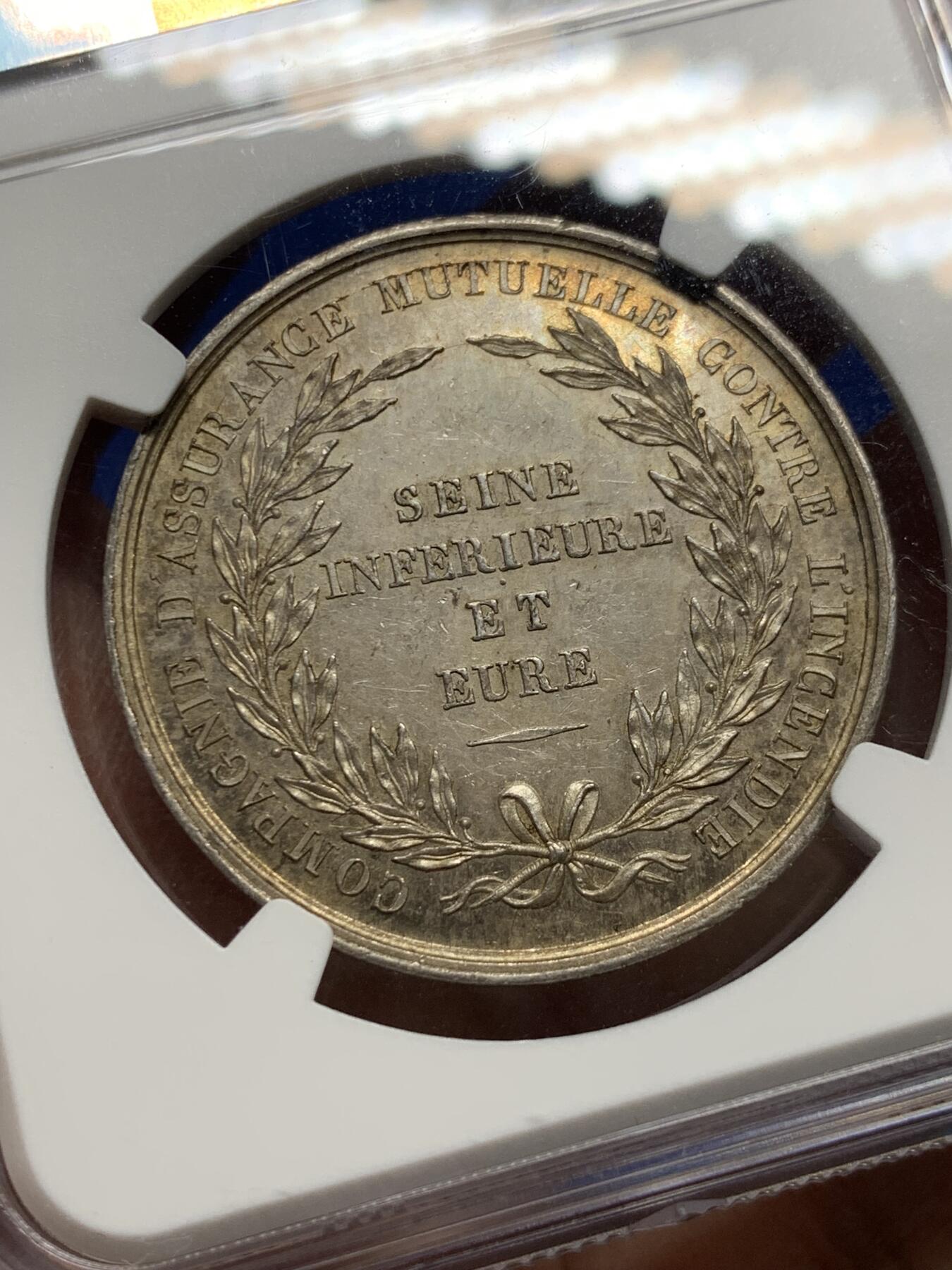 《竞宝斋》第442场 周日，周一，2场连拍 （全场包邮） NGC MS62 少见圆形火灾互助保险银章，浴火凤凰，边铭少见：BOW