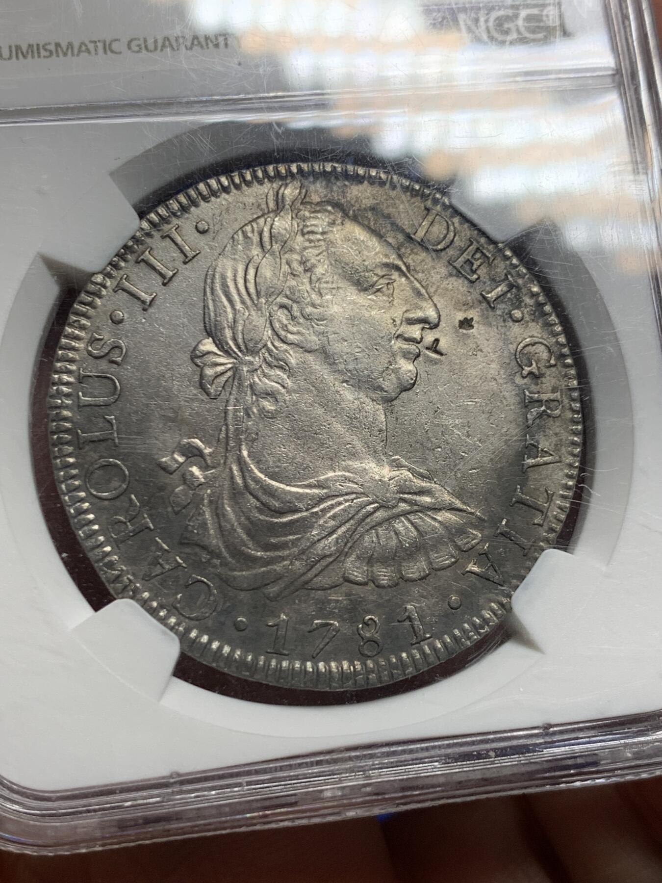 《竞宝斋》第442场 周日，周一，2场连拍 （全场包邮） NGC AUD 墨西哥 1781年 卡洛斯三世 8R大银币，au品相 米粒小戳，打制不错，细节见图。