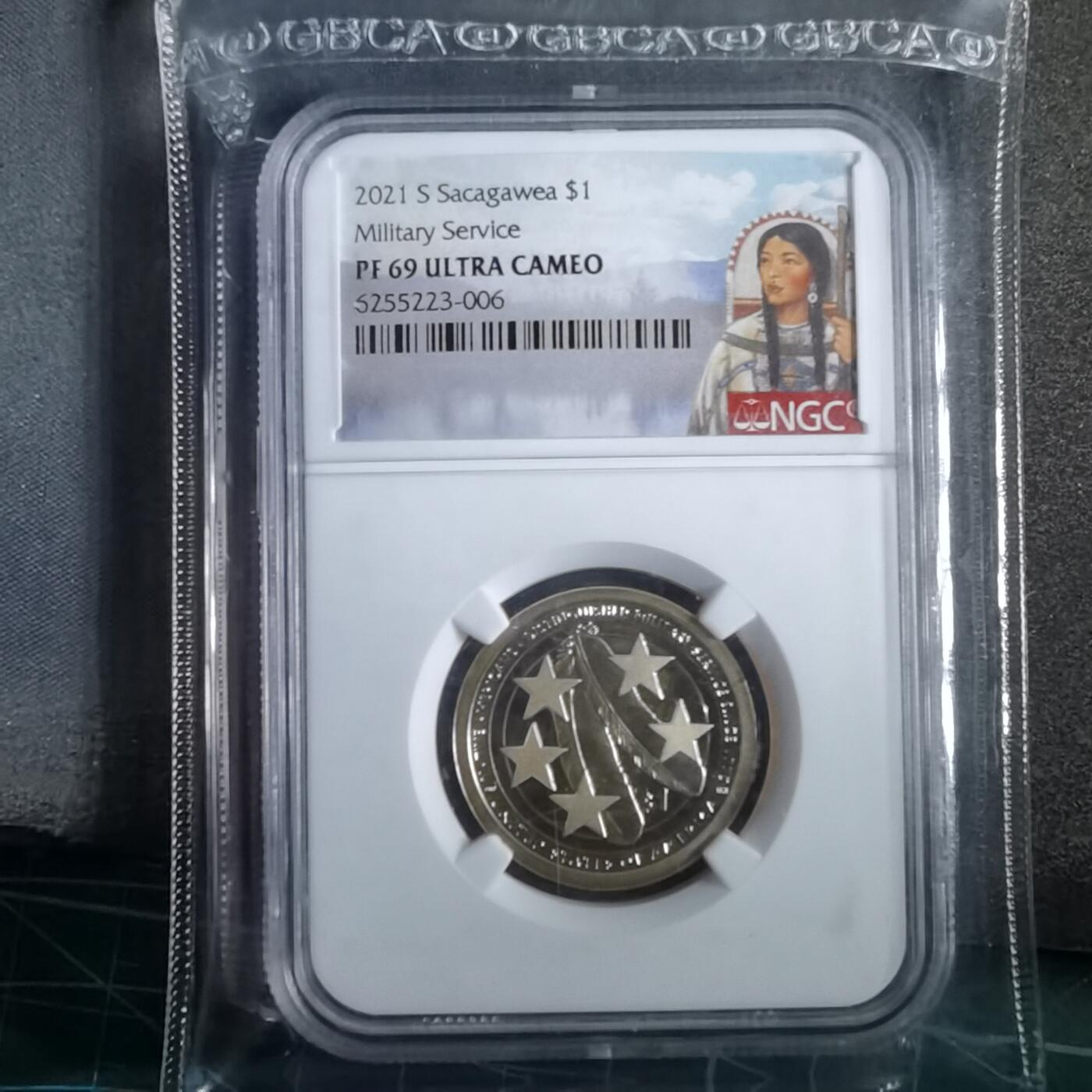 沼泽如烟--第913场 Military Service美国2021年羽毛一元精制币69分