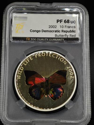 【淘币小摊】实时拍第八百零八拍   银币套币场   满百包邮可预留二周 每周一统一发货   - 2002年民主刚果10非洲法郎幻彩精制银币  野生动物保护-红蝴蝶 25克925银 发行量：5千 TQG PF68UC