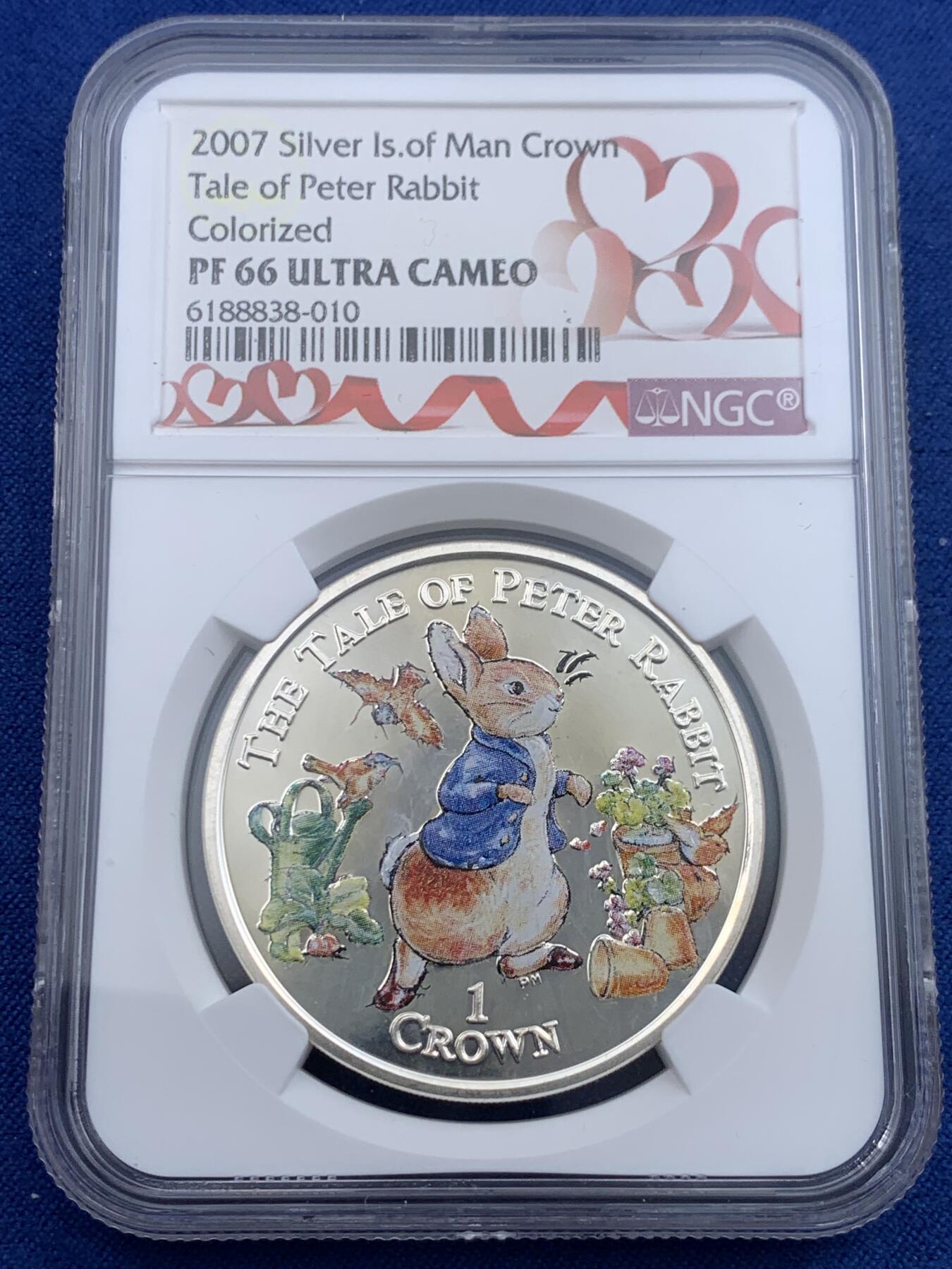 《竞宝斋》第442场 周日，周一，2场连拍 （全场包邮） NGC PF66UC 英属马恩岛 2007年 1克朗 彩色彼得兔 精制银币 少见稀缺品种的彼得兔系列小岛币，彩色版本评分都不会太高