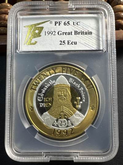 ❤️【币观天下】❤️ 第332期钱币拍卖- 2025.11.28周五晚上6点半场-长期征集拍品 - （罕见）1992年英国25欧洲货币单位双金属纪念币 威尔士 （见于克劳斯稀有币目录） TQG PF65UC