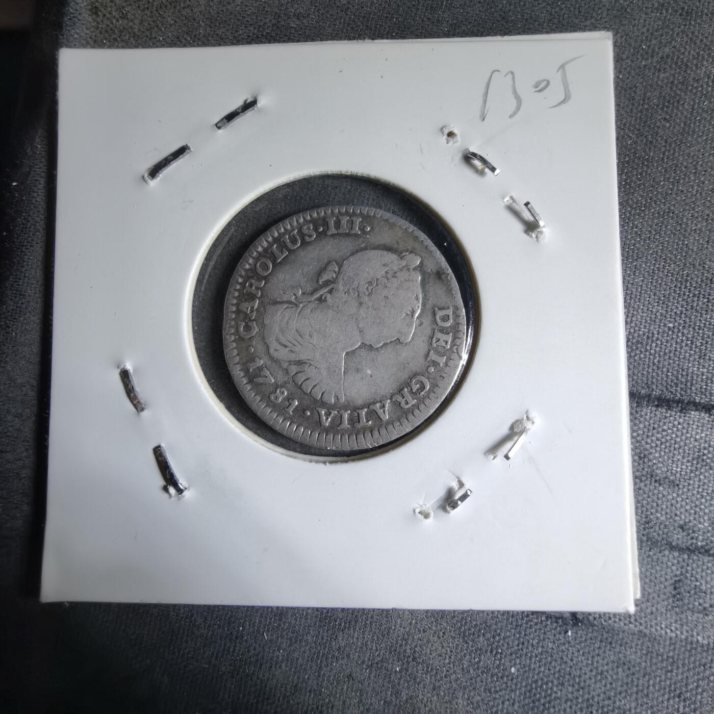 沼泽如烟--第913场 西属墨西哥1781年卡洛斯三世1R银币币面有条凹痕铸缺 币胚缺陷  喜欢收集错版的可以看看