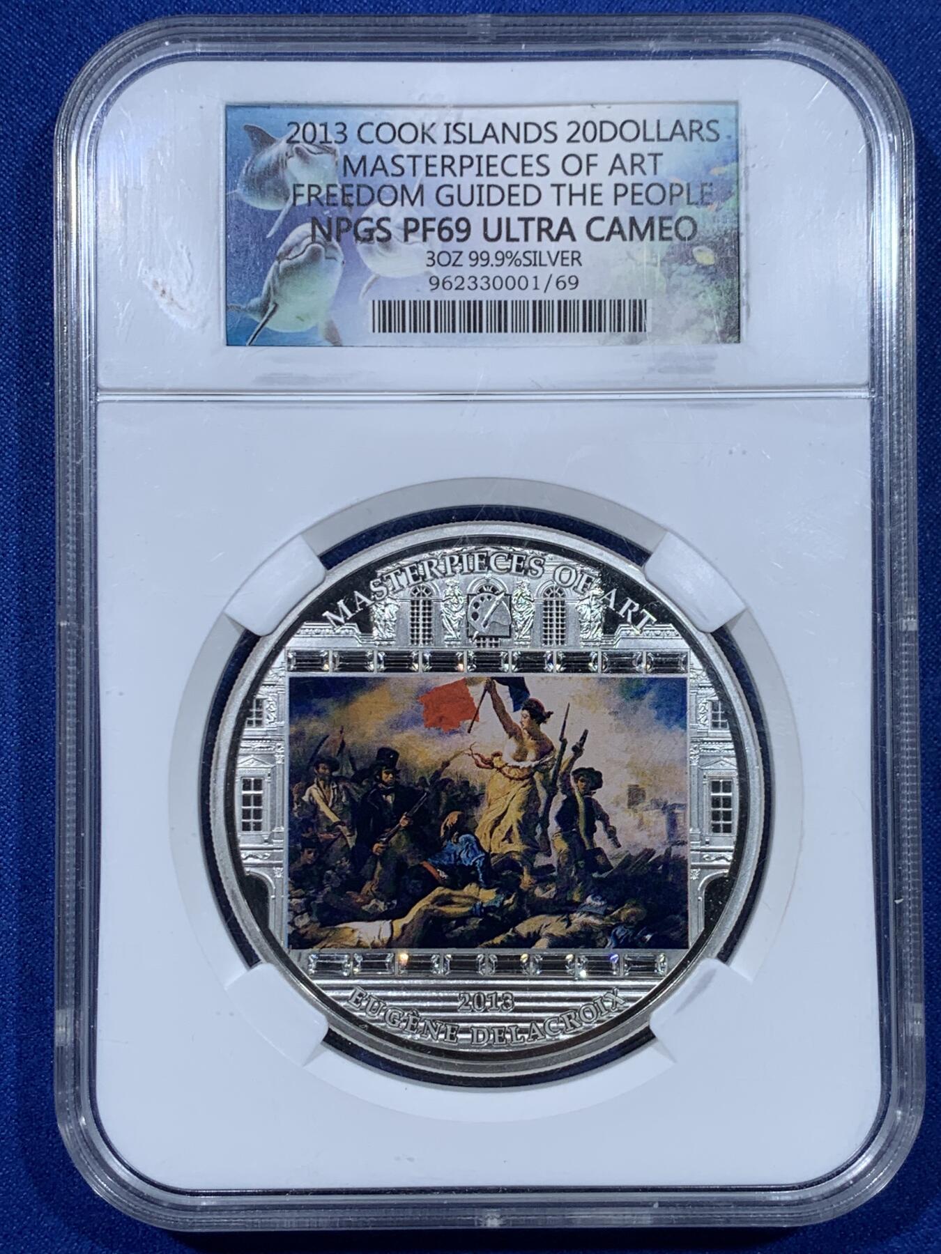 《竞宝斋》第442场 周日，周一，2场连拍 （全场包邮） 2013年库克群岛3盎司银币，999银，93.3克，经典图案:自由引导人民，周围镶嵌施华洛世奇水晶，发行量1830枚，非常给力的压手感。