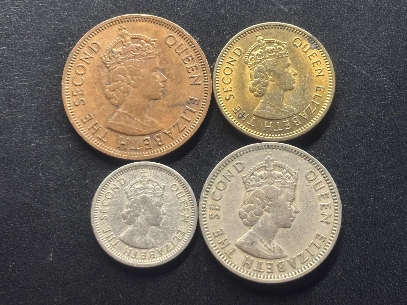 邮泉阁限时拍卖第三十七场 英国殖民地、属地硬币专场（硬币在国外。请付邮费6元。） 英属东加勒比皇冠版4枚