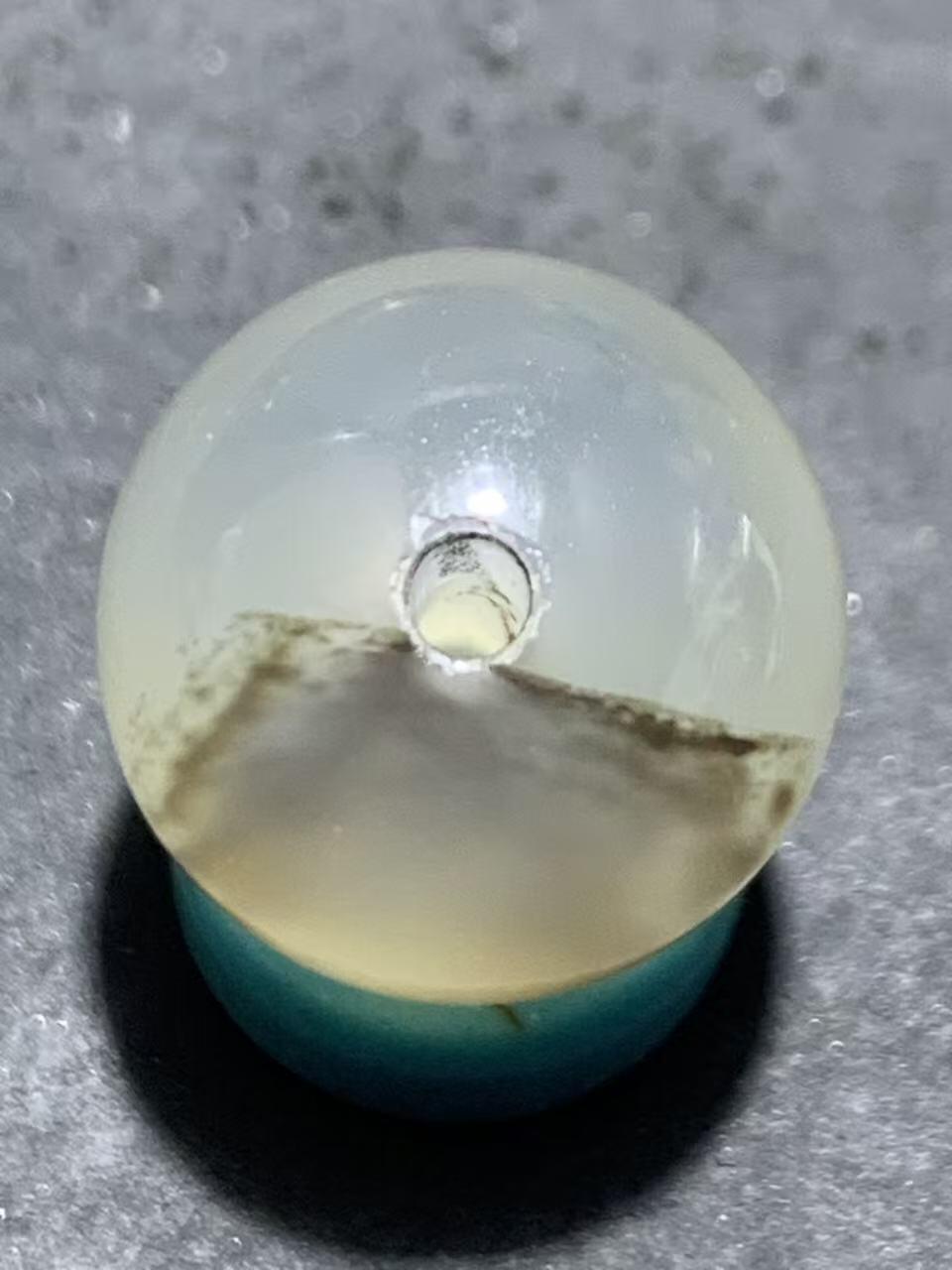 原皮海洋玉髓通货随形圆珠一颗，