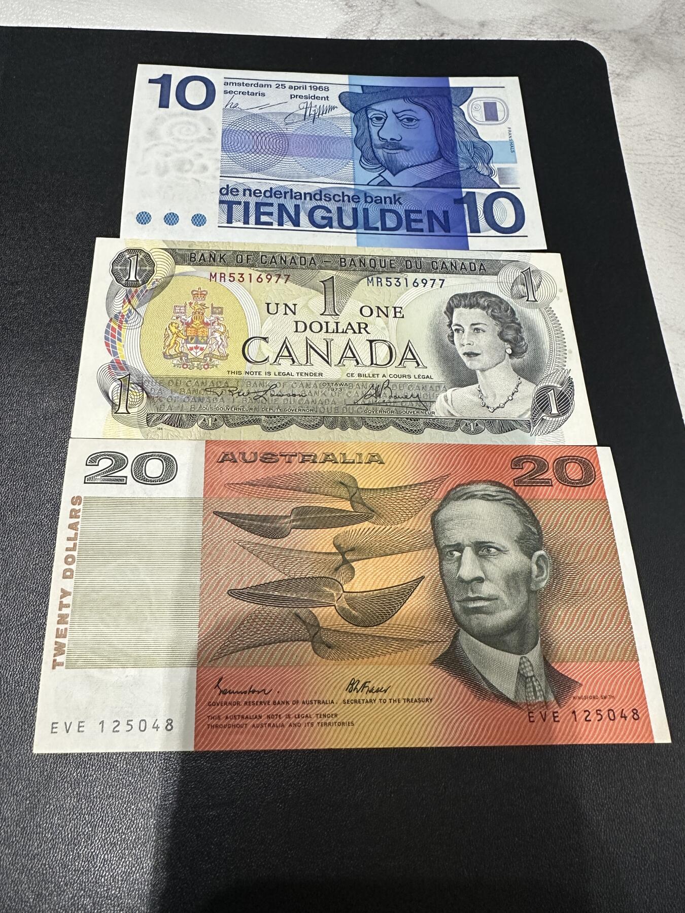 《外钞收藏家》第五百八十八期（优质场）（本平台长期征集拍品、欢迎藏友们联系合作） 荷兰人像版10盾、加拿大1元、澳大利亚20 三张一起 非全新 品相如图