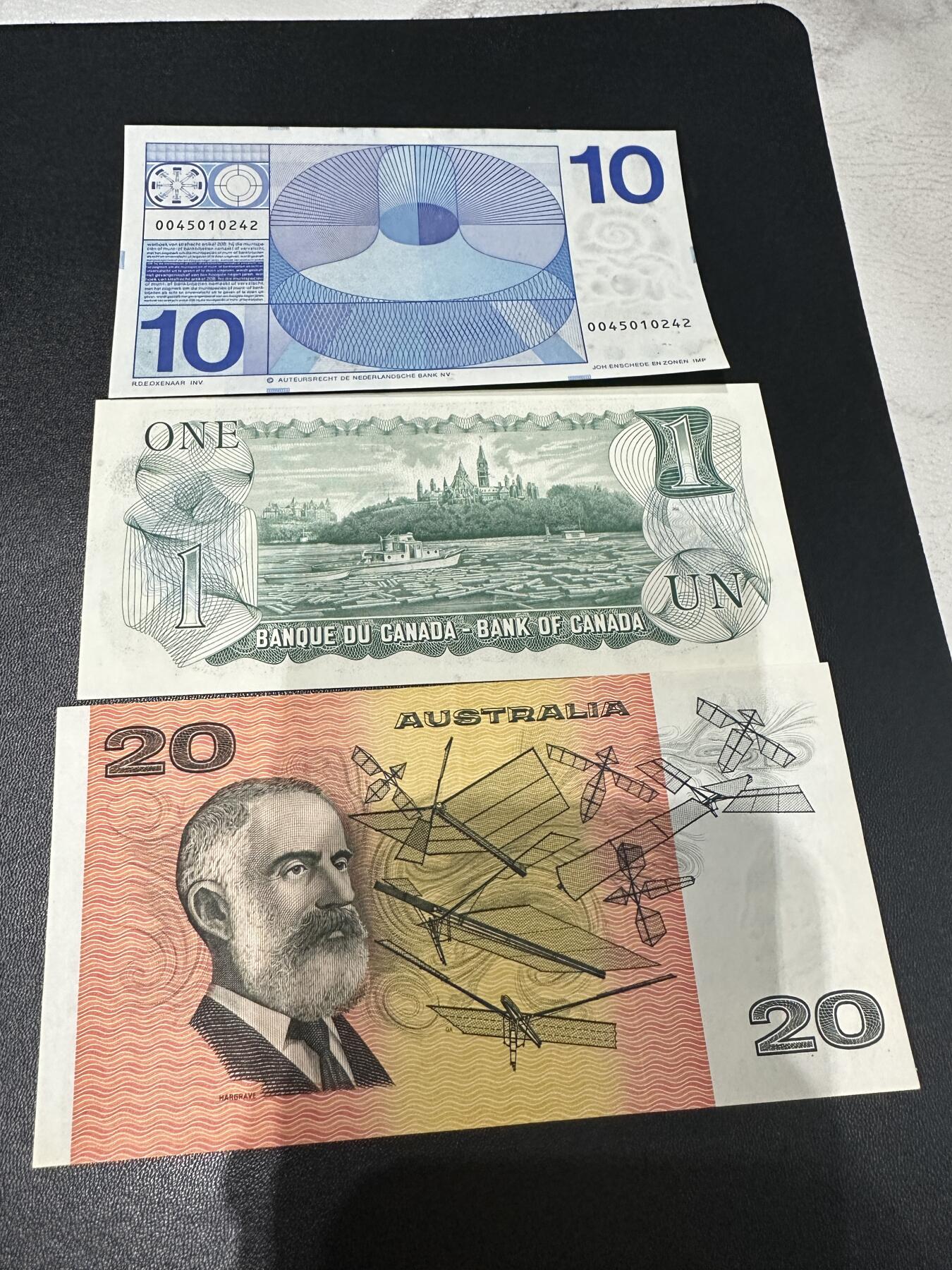 《外钞收藏家》第五百八十八期（优质场）（本平台长期征集拍品、欢迎藏友们联系合作） 荷兰人像版10盾、加拿大1元、澳大利亚20 三张一起 非全新 品相如图