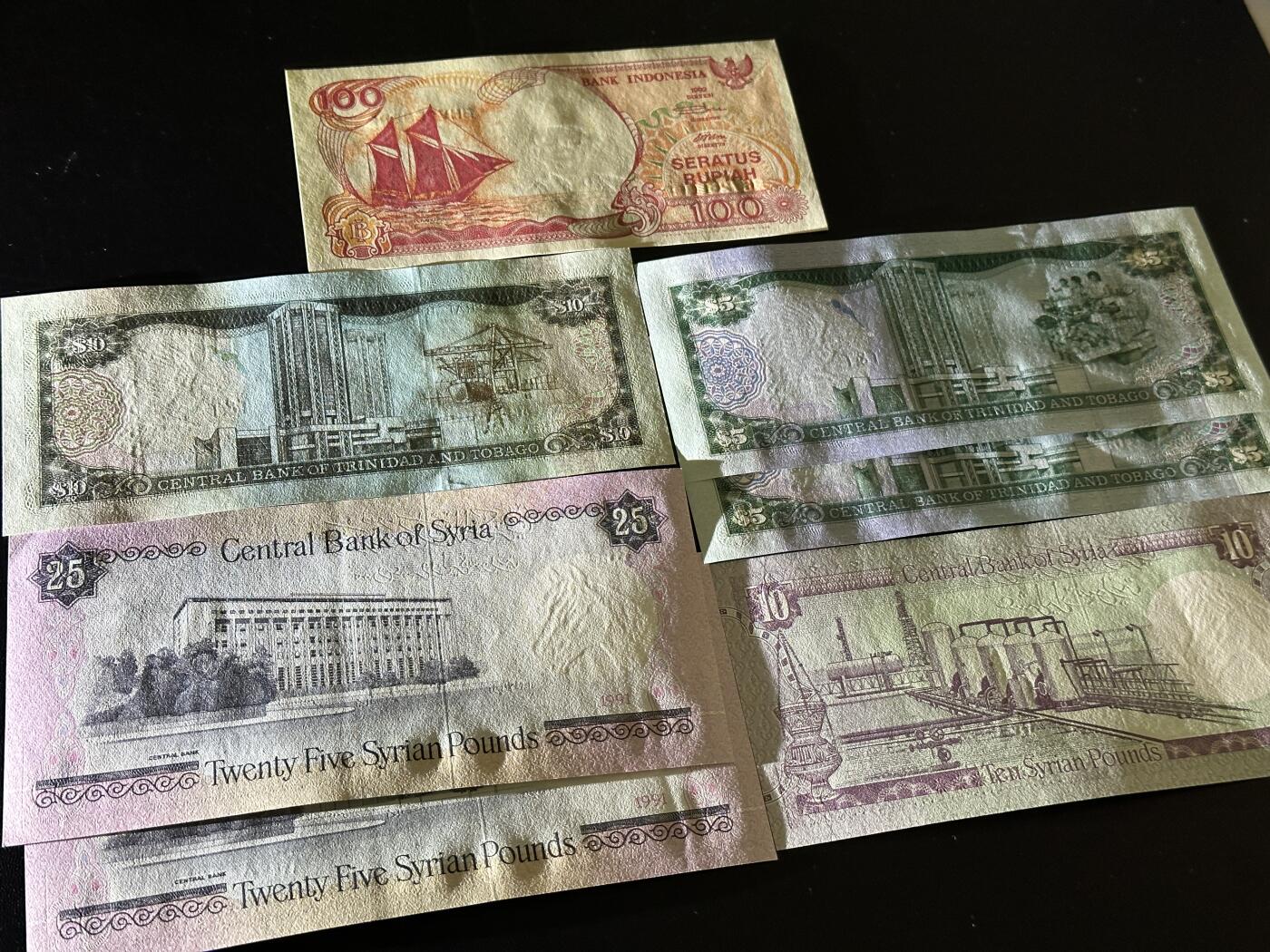 《外钞收藏家》第五百八十八期（优质场）（本平台长期征集拍品、欢迎藏友们联系合作） 印尼100卢比+特里达尼亚和多巴哥3张+叙利亚3张 一起 全新UNC
