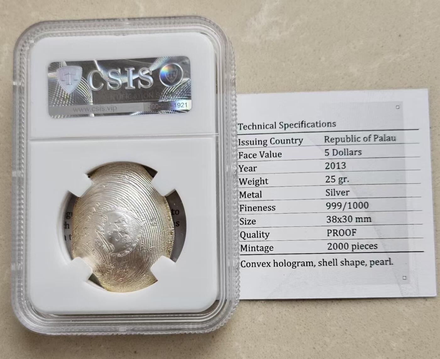 ❤️【币观天下】❤️ 第332期钱币拍卖- 2025.11.28周五晚上6点半场-长期征集拍品 帕劳2013年玉蚌含珠幻彩银币信泰评级带证书有氧化