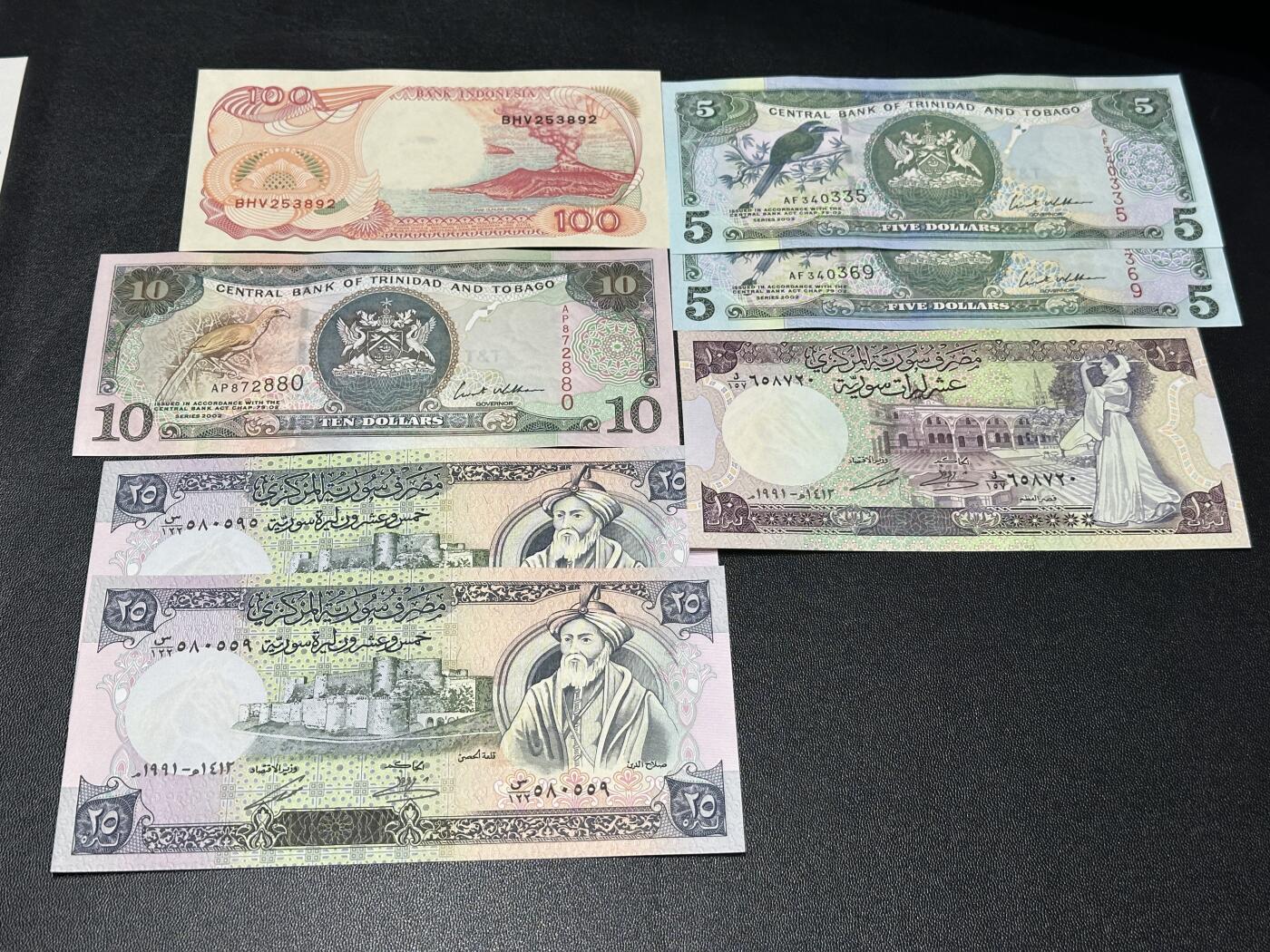 《外钞收藏家》第五百八十八期（优质场）（本平台长期征集拍品、欢迎藏友们联系合作） 印尼100卢比+特里达尼亚和多巴哥3张+叙利亚3张 一起 全新UNC