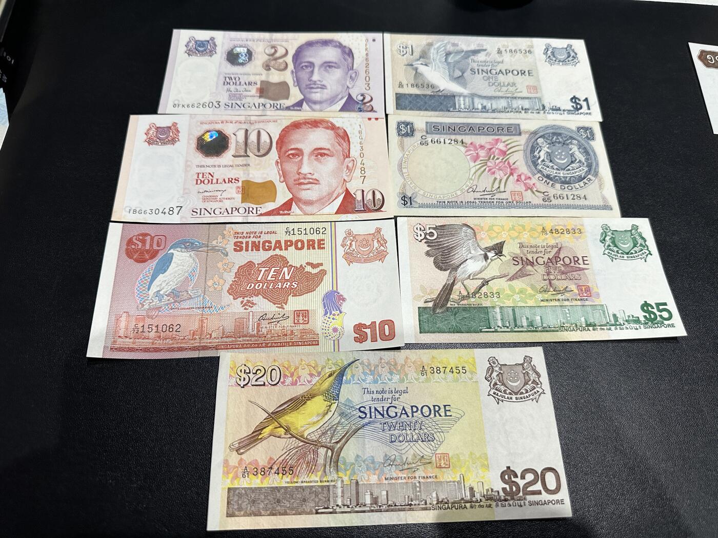 《外钞收藏家》第五百八十八期（优质场）（本平台长期征集拍品、欢迎藏友们联系合作） 新加坡人像、鸟版、花版 7张一起 有新有旧 品相如图