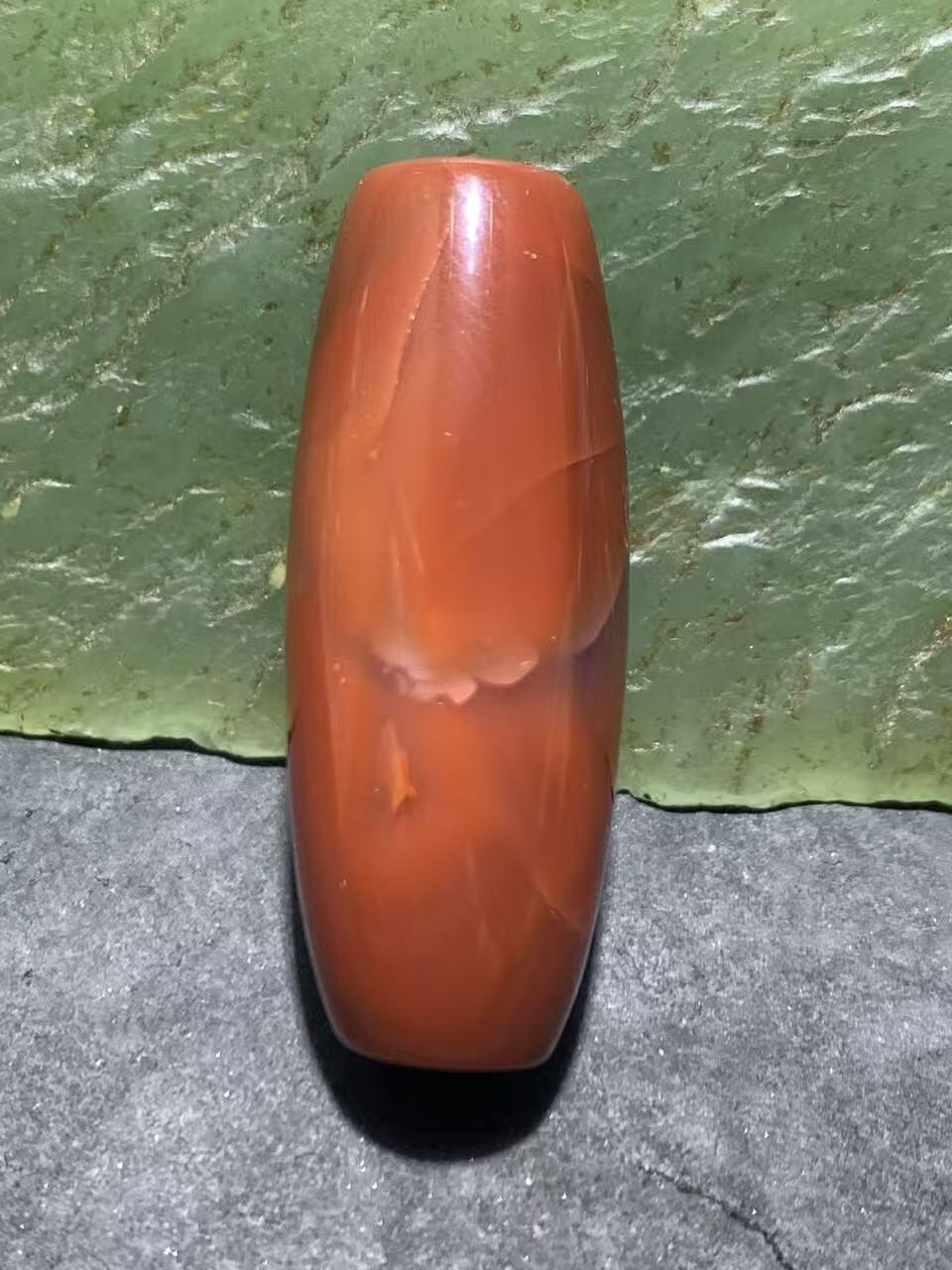 高玉化北漂战国红玛瑙瑕疵桶珠一个！