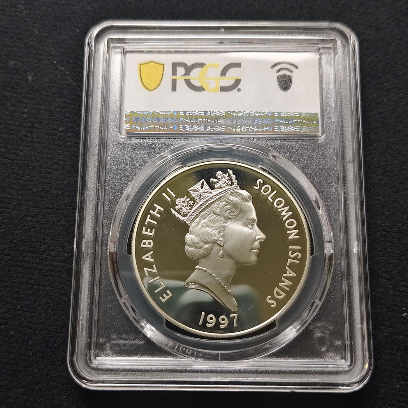 【全场包邮】纯粹捡漏拍481场（免费代拍第18场） 所罗门群岛1997年10元女王金婚局部镀金精制克朗型纪念银币-PCGS PR69 DCAM