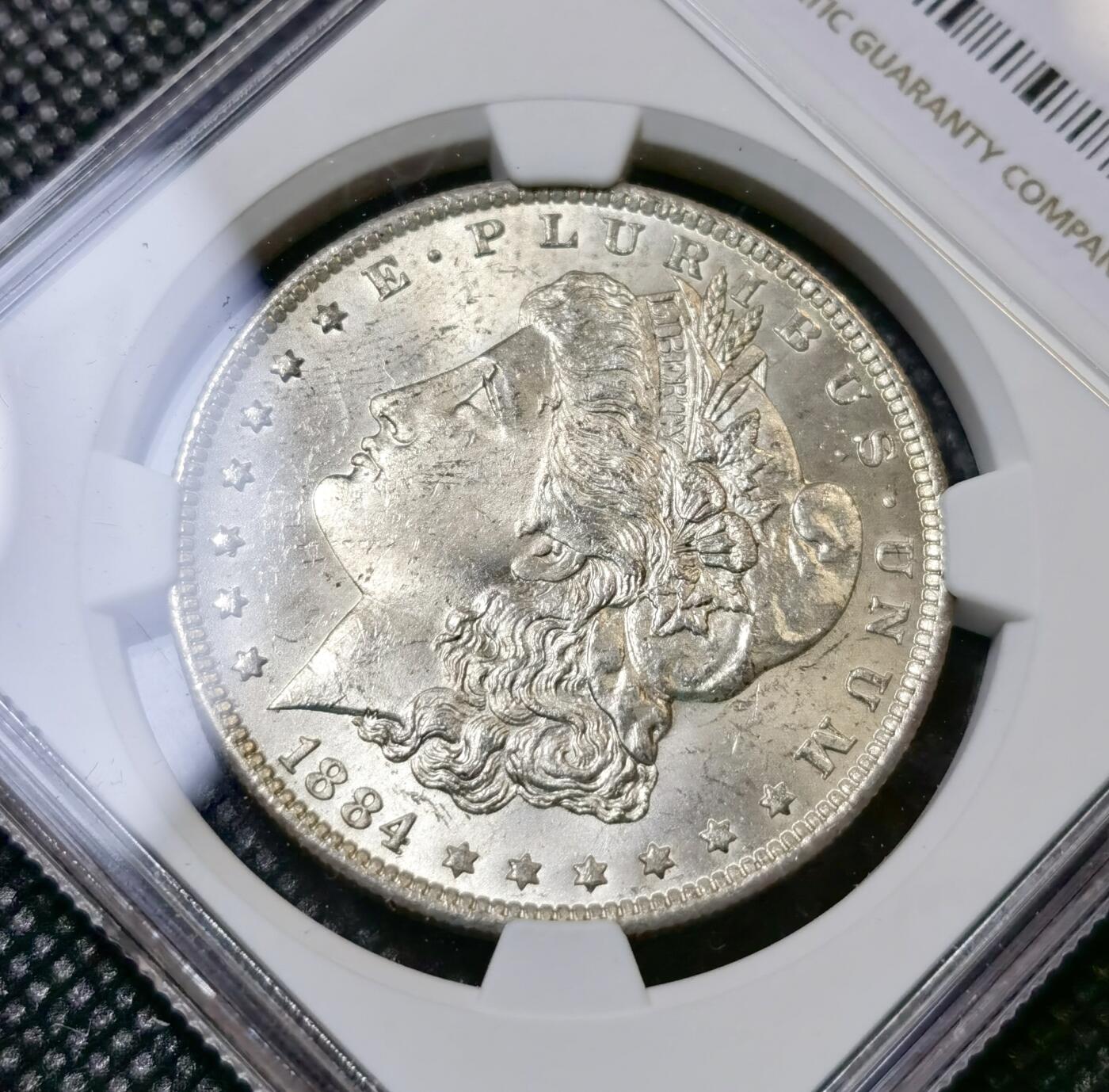 甄臻铺-世界币章拍卖（第40期）送拍享返佣金等优惠多多 NGC-MS64 1884年O版摩根，币面干净，不是烂大街的年份