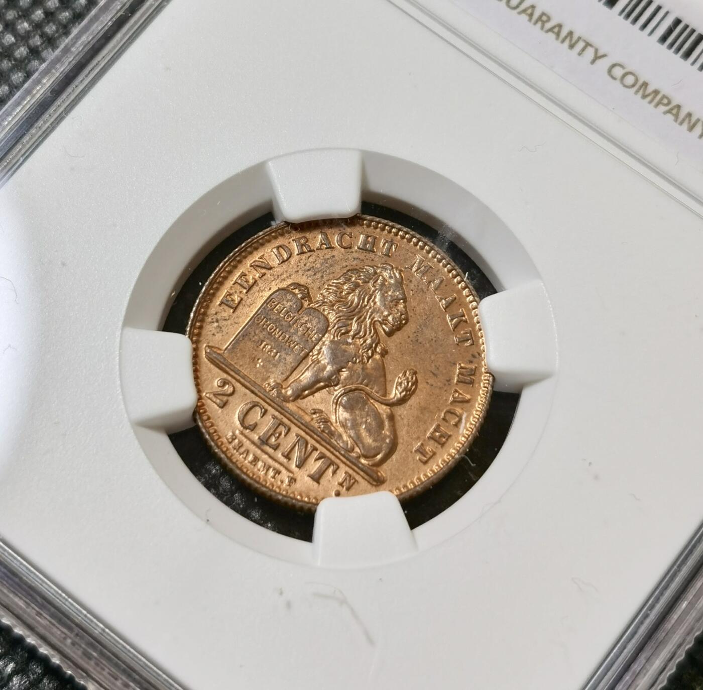 甄臻铺-世界币章拍卖（第40期）送拍享返佣金等优惠多多 NGC-MS63RB 比利时1910二分铜币，铜光四溢，经典品种，很漂亮的一枚